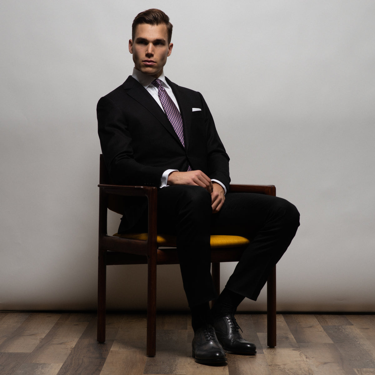 How to Style A Men's Black Suit