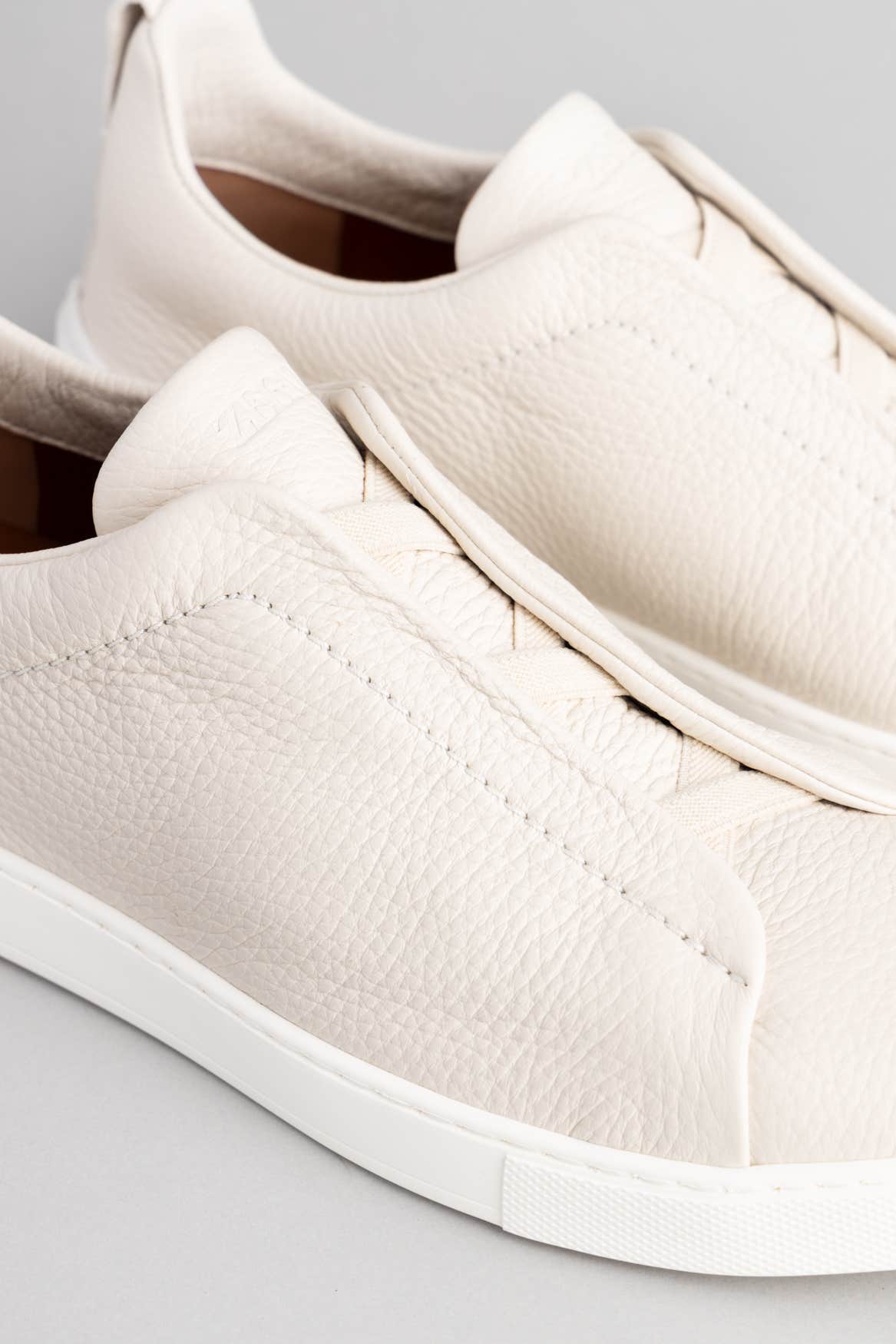 OFF WHITE DEERSKIN TRIPLE STITCH SNEAKERS