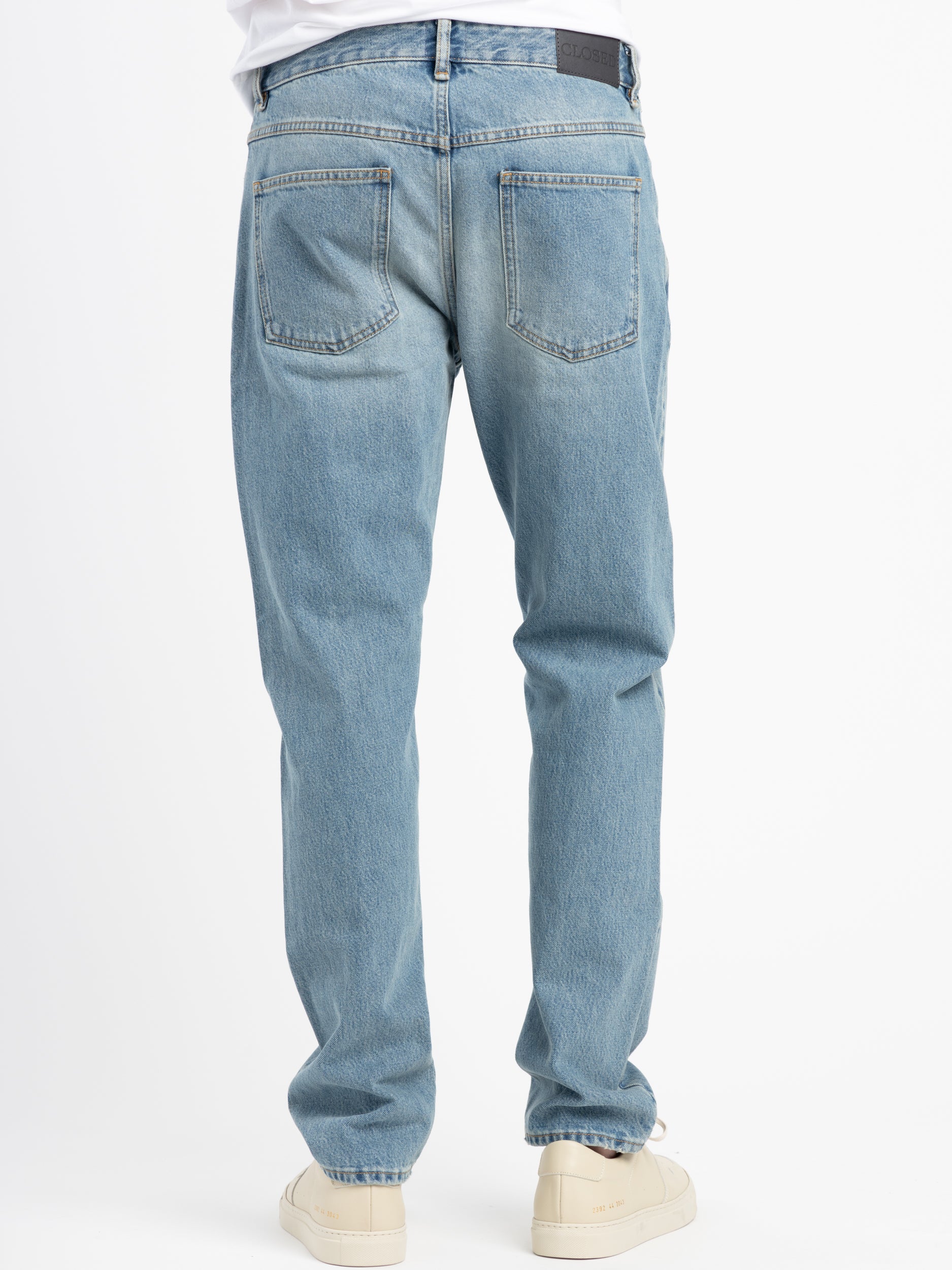 Light blue hot sale tapered jeans