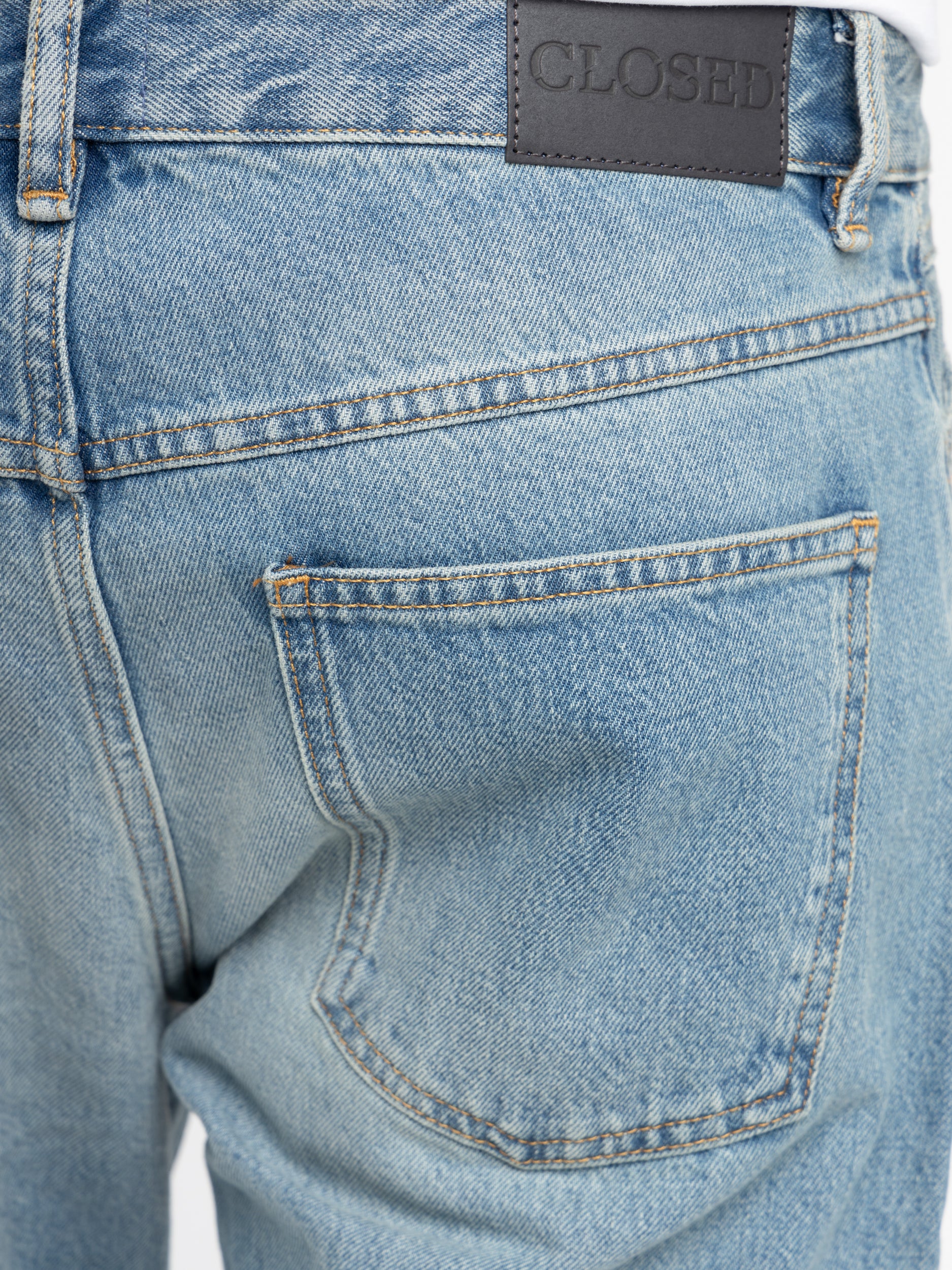 Low sales tapered jeans