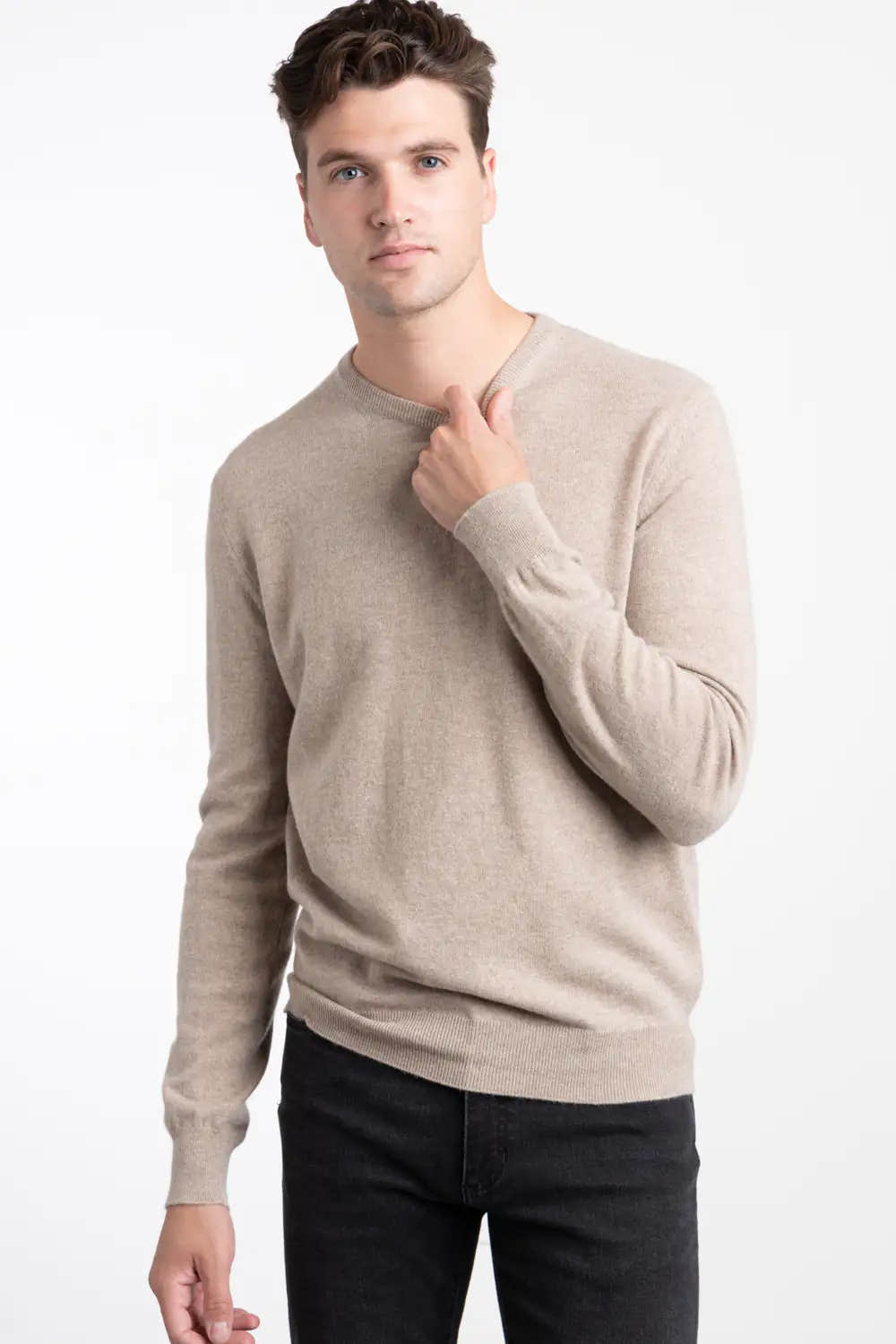 Oat coloured ZEGNA Oasi Cashmere Crewneck Sweater being worn by a white man with brown hair against a white background