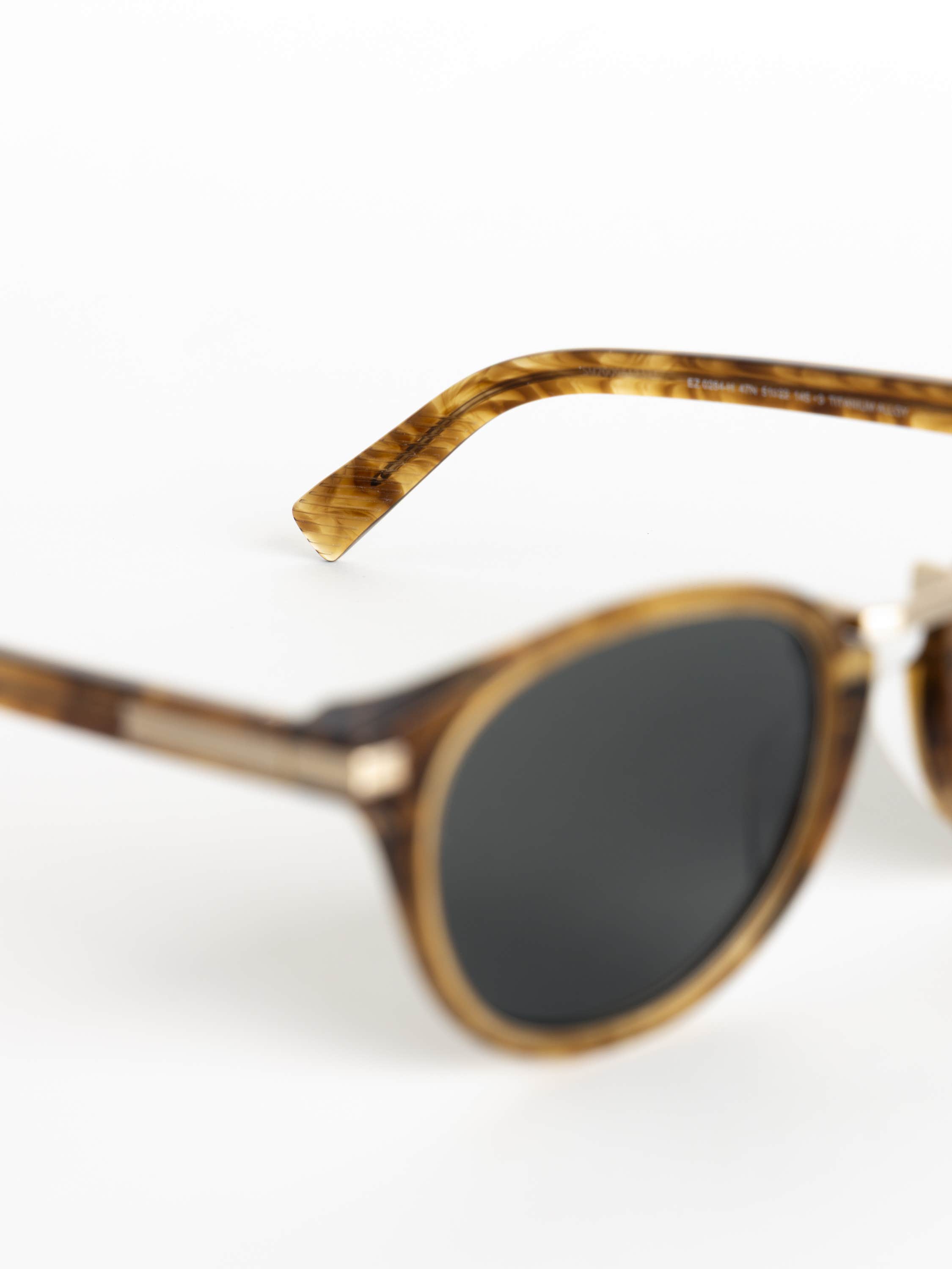 Transparent Light Brown Acetate and Titanium Sunglasses