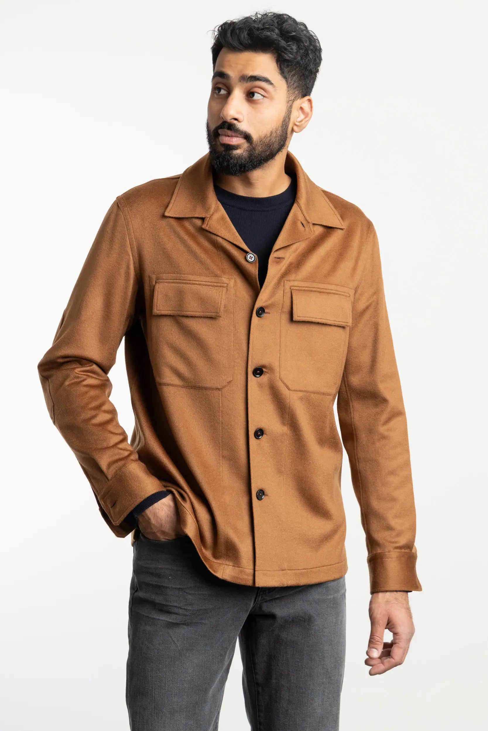 Man wearing a vicuna coloured oasi cashmere overshirt from ZEGNA
